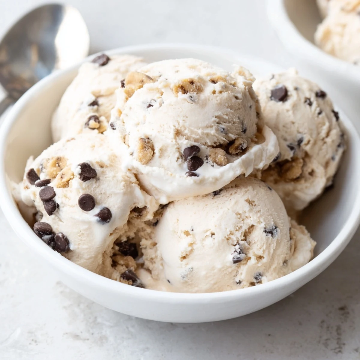 Creamy cottage cheese ice cream swirled with chewy cookie dough bites.  
