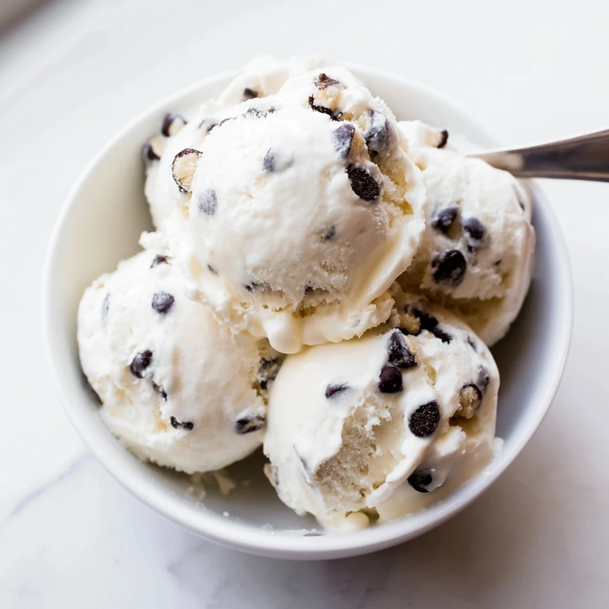 Homemade cottage cheese ice cream loaded with mini chocolate chip cookie dough.  