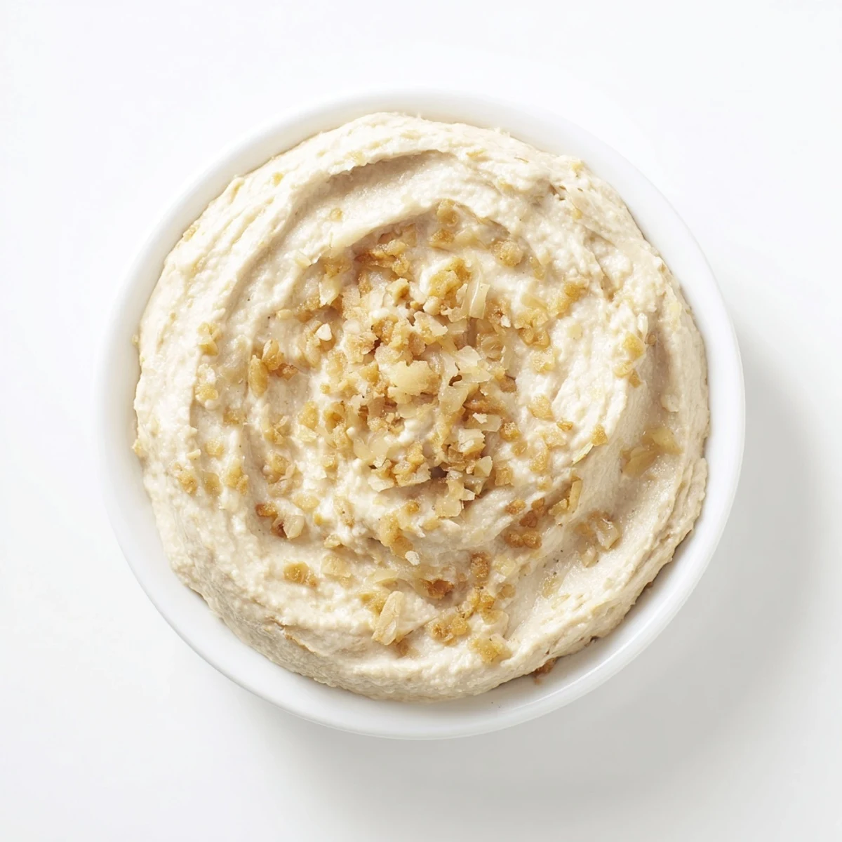 Golden, bubbling Caramelized Onion and Bacon Dip, a perfect party appetizer with crispy bacon.