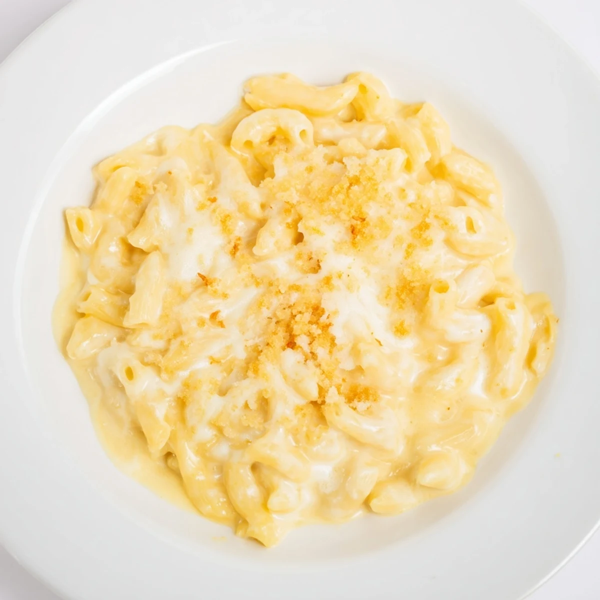 Creamy Easy Tinis Mac & Cheese with a crusty, golden breadcrumb topping, perfect for an easy dinner.