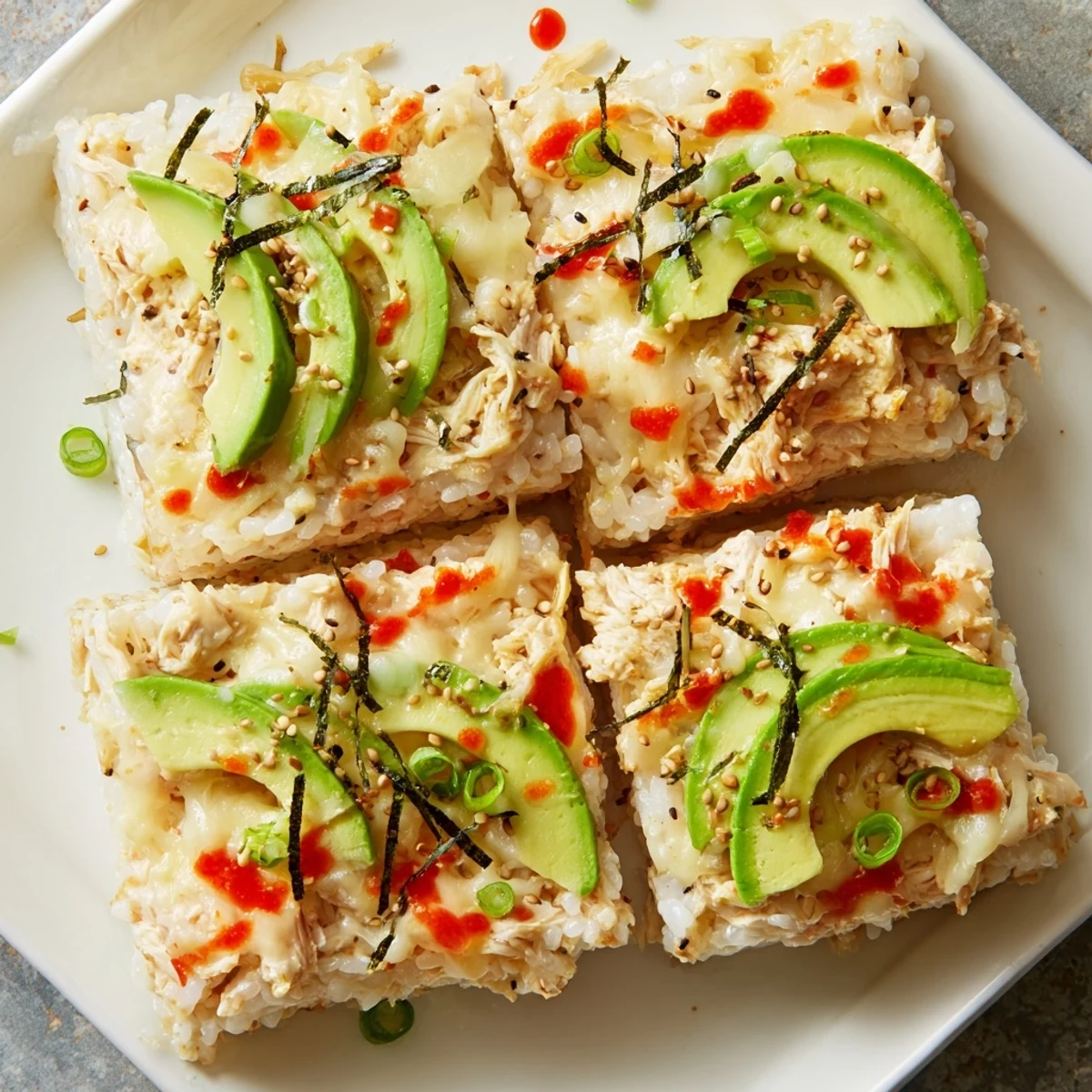 A hearty pan of Chicken Sushi Bake with melted cheese, perfect for a flavorful weeknight meal.