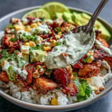 Savory Street Corn Chicken Rice Bowls, a hearty, colorful Mexican-inspired meal.
