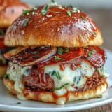 Deliciously grilled hot honey pizza burgers bursting with savory pizza flavor.