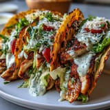 Crunchy Caesar Salad Smash Tacos featuring seasoned chicken and creamy dressing.