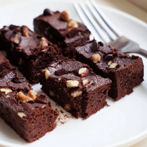 Rich, fudgy zero-waste brownies using nut-milk pulp, topped with chocolate chips.  