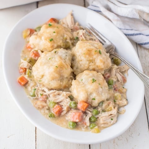 Golden, bubbly Chicken and Dumplings Casserole, a warm family favorite with fluffy, baked dumplings.