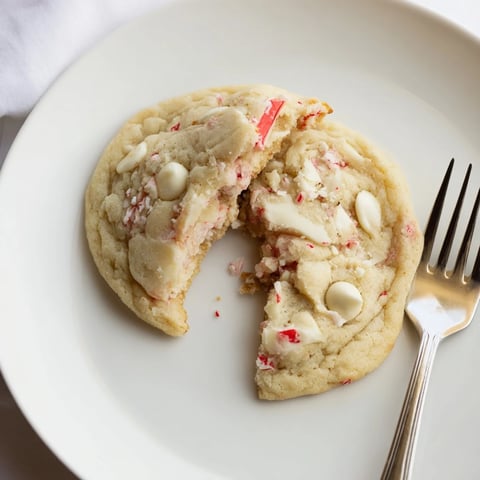 Warm, gooey White Chocolate Peppermint Bark Cookies, a holiday favorite with sweet, crunchy candy topping.