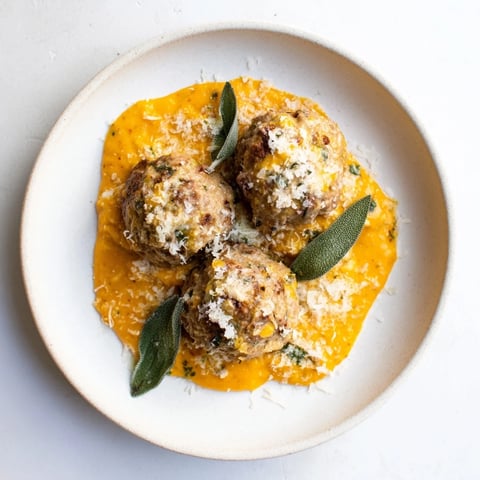 A comforting bowl of Turkey Meatballs with Pumpkin Sage Sauce, ready to be enjoyed.