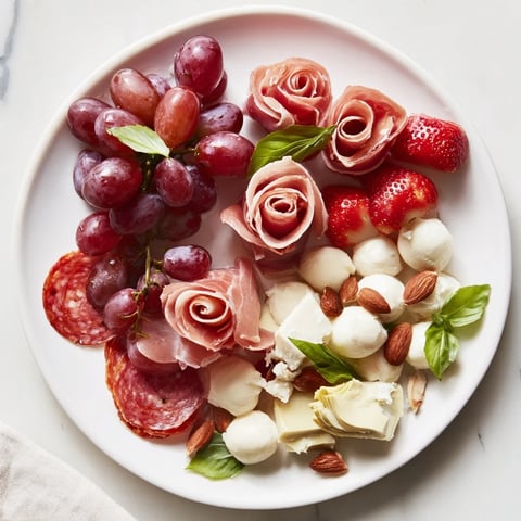 Prosciutto rose bouquet board: A feast for the eyes, this platter features elegant prosciutto roses atop assorted cheeses.