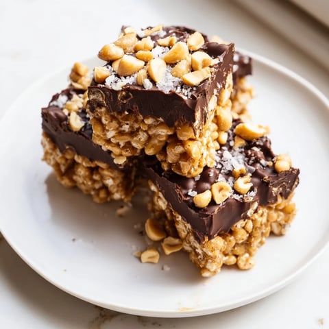 Peanut Butter Chocolate Rice Cakes, a no-bake treat: creamy peanut butter drizzled, chocolate-topped, ready to freeze.