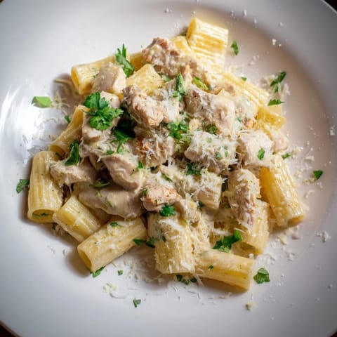 Golden, bite-sized chicken pieces in the Creamy Garlic Parmesan Chicken Rigatoni, ready to be enjoyed.
