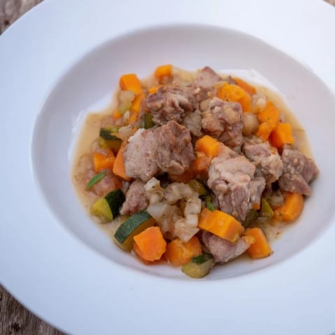 Homemade Sweet Lamb Platter for Baby, featuring soft lamb cubes and tender veggies in broth.