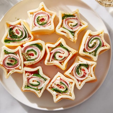 These colorful Party Sandwiches offer a delightful array of textures and flavors, ready to enjoy.