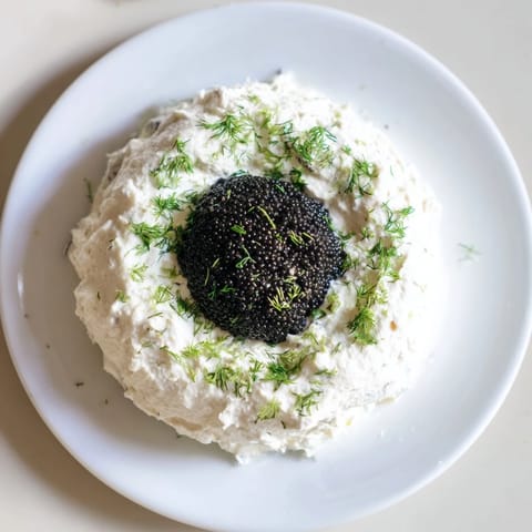 Black caviar gleams in this stunning The Diamond Inlay, a simple appetizer for a sophisticated gathering.