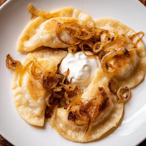 These savory, freshly-cooked Polish pierogi are perfect with a dollop of cool sour cream.