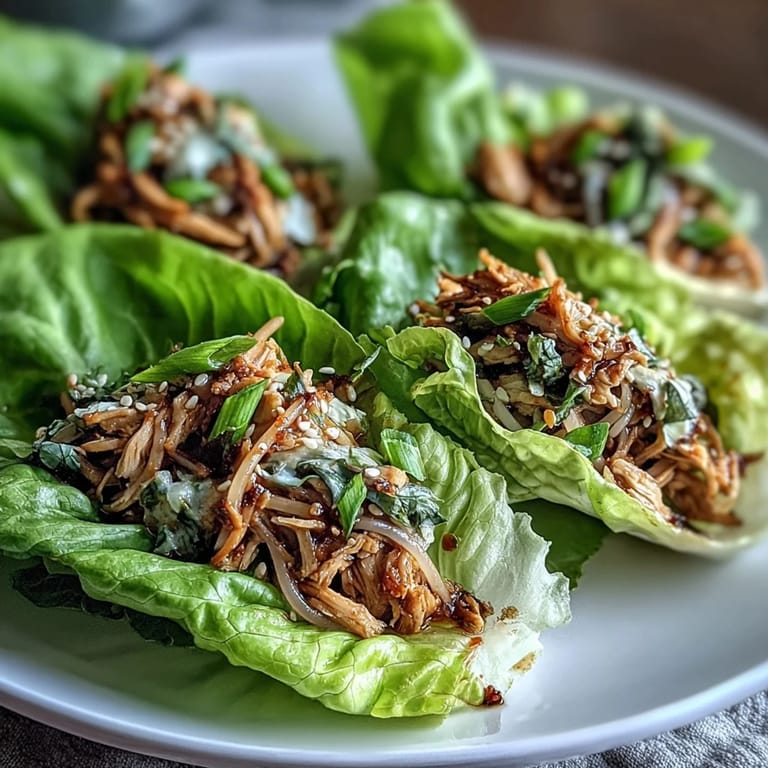 Garnished with sesame seeds and scallions, these Asian-inspired lettuce cups make a light, satisfying gluten-free main dish.